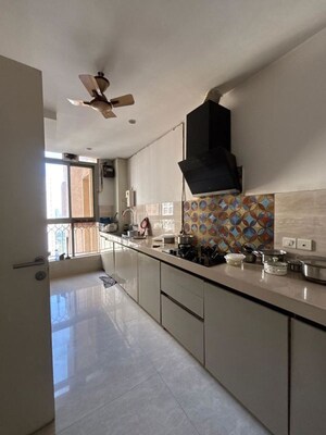 Kitchen in 3 BHK Apartment at Hiranandani Skylark Enclave, Ghodbunder Road – for Rent
