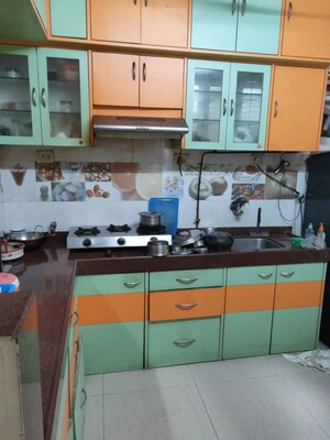 Kitchen in 2 BHK Apartment at Soham Plaza, Manpada – for Rent