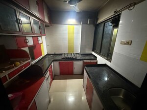 Kitchen in 3 BHK Apartment at Mahakali Kalika Towers, Khopat – for Sale