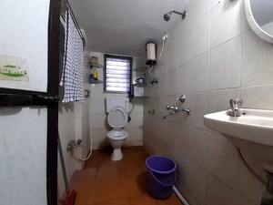 Bathroom in 3 BHK Apartment at Doordarshan CHS, Goregaon East – for Rent