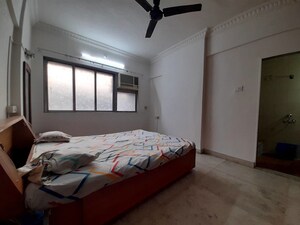 Bedroom in 3 BHK Apartment at Doordarshan CHS, Goregaon East – for Rent