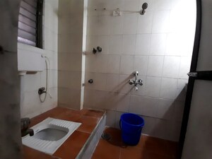 Bathroom in 3 BHK Apartment at Doordarshan CHS, Goregaon East – for Rent