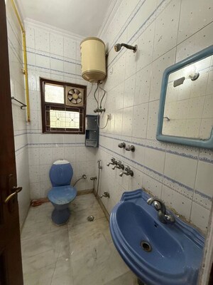 Bathroom in 2 BHK Builder Floor at Kalkaji – for Rent