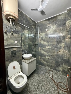 Bathroom in 2 BHK Builder Floor at Kalkaji – for Rent