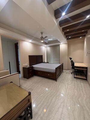 Bedroom in 3 BHK Builder Floor at South Extension ii – for Rent