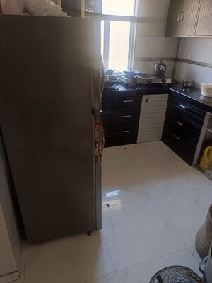 Kitchen in 2 BHK Apartment at Eff Jumbo Darshan CHS, Andheri East – for Rent