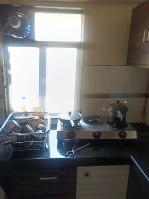 Kitchen in 2 BHK Apartment at Eff Jumbo Darshan CHS, Andheri East – for Rent