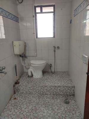 Bathroom in 2 BHK Apartment at Shriram Nagar CHS, Aundh – for Rent