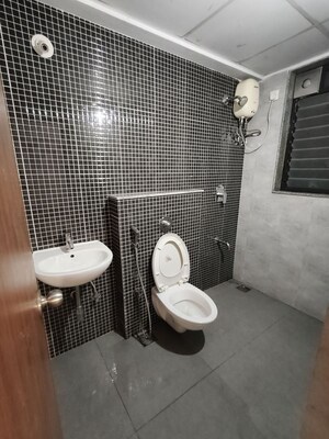 Bathroom in 2 BHK Apartment at Lodha Lakeshore Greens, Dombivli East – for Rent