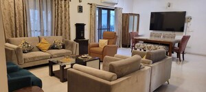 Living Room in 4 BHK Apartment at Tata Raheja Raisina Residency, Sector 59 – for Sale