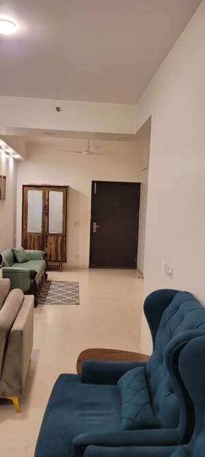Living Room in 4 BHK Apartment at Tata Raheja Raisina Residency, Sector 59 – for Sale