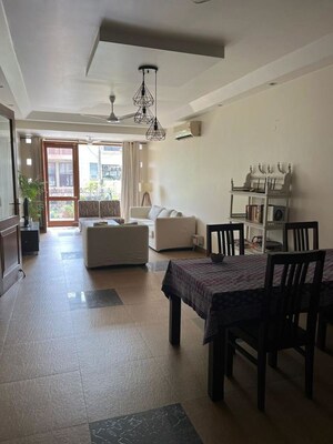 Living Room in 3 BHK Apartment at Defence Colony – for Rent