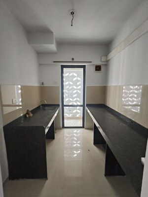 Kitchen in 2 BHK Apartment at Lodha Lakeshore Greens, Dombivli East – for Rent