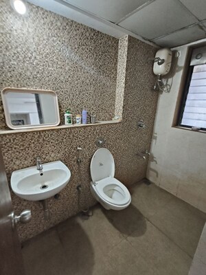 Bathroom in 2 BHK Apartment at Lodha Lakeshore Greens, Dombivli East – for Rent