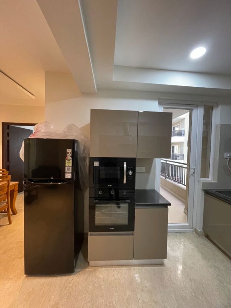 Kitchen, maya-green-lotus-utsav 3 Bedroom 2100 Sq.Ft. Apartment In International Airport Road Zirakpur 10389913