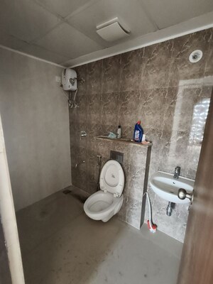 Bathroom in 2 BHK Apartment at Lodha Downtown, Dombivli East – for Rent