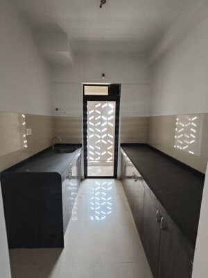 Kitchen in 2 BHK Apartment at Lodha Downtown, Dombivli East – for Rent