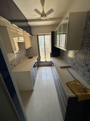 Kitchen in 2 BHK Apartment at Poonam Estate Cluster I, Mira Road – for Rent