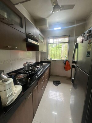 Kitchen in 1 BHK Apartment at Parsik Nagar – for Sale