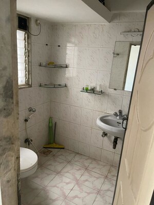Bathroom in 2 BHK Apartment at Serenity Tower, Andheri West – for Rent
