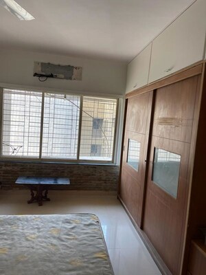 Room in 2 BHK Apartment at Serenity Tower, Andheri West – for Rent