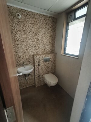 Bathroom in 2 BHK Apartment at Lodha Downtown, Dombivli East – for Rent