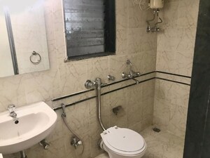 Bathroom in 2 BHK Apartment at Serenity Complex, Andheri West – for Rent