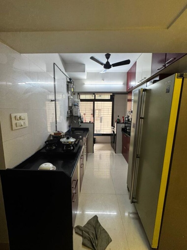Kitchen, united-unity-heights 2 Bedroom 740 Sq.Ft. Penthouse In Malad West Mumbai 10390145