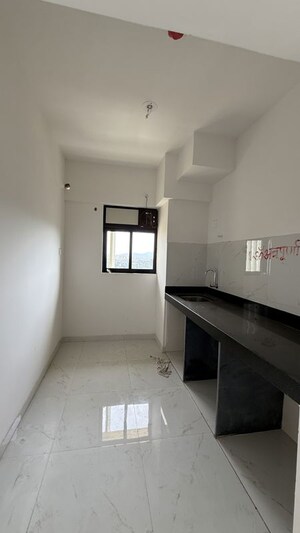 Kitchen in 2 BHK Apartment at Runwal Gardens Phase 3, Dombivli East – for Rent