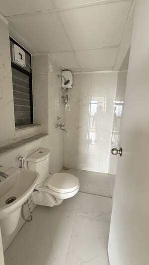 Bathroom in 2 BHK Apartment at Runwal Gardens Phase 3, Dombivli East – for Rent