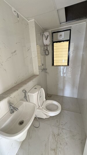 Bathroom in 2 BHK Apartment at Runwal Gardens Phase 3, Dombivli East – for Rent