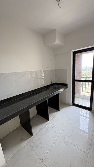 Kitchen in 2 BHK Apartment at Runwal Gardens Phase 3, Dombivli East – for Rent