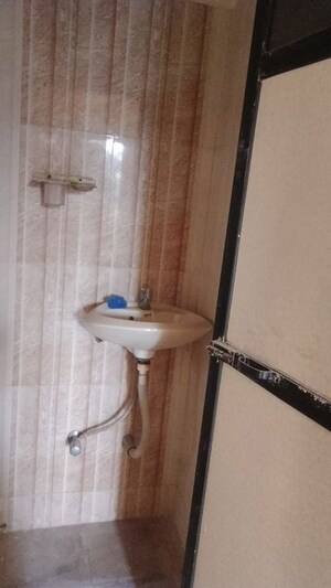 Bathroom in 1 BHK Apartment at Charms Heights, Titwala – for Sale