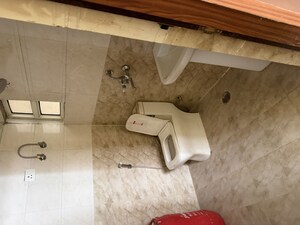 Bathroom in 3 BHK Apartment at Javin Raj Empire, Raj Nagar Extension – for Rent