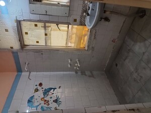 Bathroom in 2 BHK Apartment at Shipra Suncity, Vaibhav Khand – for Rent