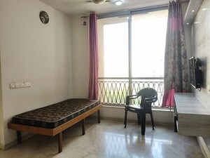 Living Room in 1 BHK Apartment at Hiranandani Lavinia, Ghodbunder Road – for Rent