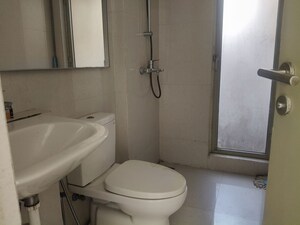 Bathroom in 1 BHK Apartment at Hiranandani Lavinia, Ghodbunder Road – for Rent