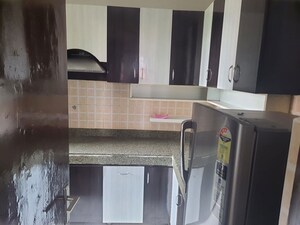 Kitchen in 3.5 BHK Apartment at Mahindra Aura, Sector 110a – for Rent