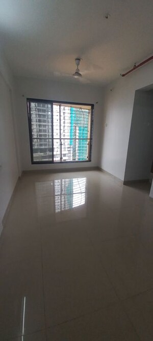 Room in 1 BHK Apartment at Haware 16, Malad East – for Rent