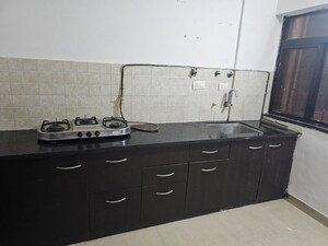 Kitchen in 2 BHK Apartment at Brahma Suncity, Wadgaon Sheri – for Rent
