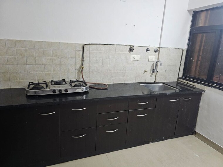 Kitchen, brahma-suncity 2 Bedroom 1200 Sq.Ft. Apartment In Wadgaon Sheri Pune 10390283