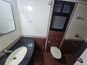 Bathroom in 2 BHK Apartment at Brahma Suncity, Wadgaon Sheri – for Rent