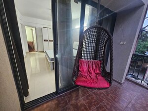 Living Room in 2 BHK Apartment at Brahma Suncity, Wadgaon Sheri – for Rent