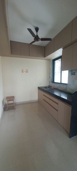 Kitchen in 2 BHK Apartment at Om Shivshakti CHS, Malad East – for Rent
