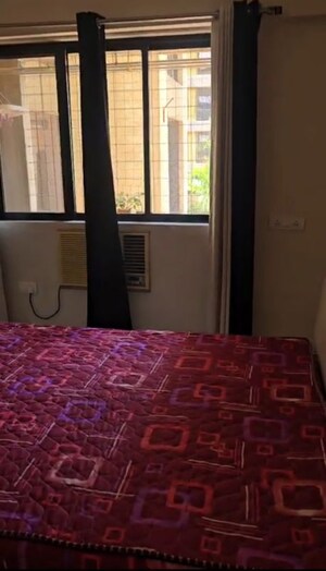 Bedroom in 2 BHK Apartment at Group Seven Rushi Heights, Goregaon East – for Rent