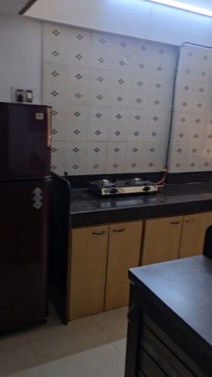 Kitchen in 2 BHK Apartment at Group Seven Rushi Heights, Goregaon East – for Rent