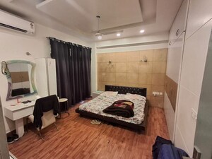 Bedroom in 3 BHK Builder Floor at Omaxe NRI City Center, Omega Ii Greater Noida – for Rent