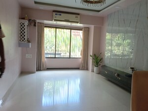 Living Room in 2 BHK Apartment at Abrol Krishna Balaji, Malad West – for Rent