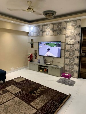 Living Room in 1 BHK Apartment at Aura Heights, Girgaon – for Sale