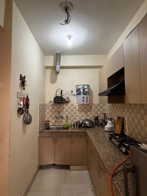 Kitchen in 3 BHK Apartment at High End Paradise II, Raj Nagar Extension – for Rent